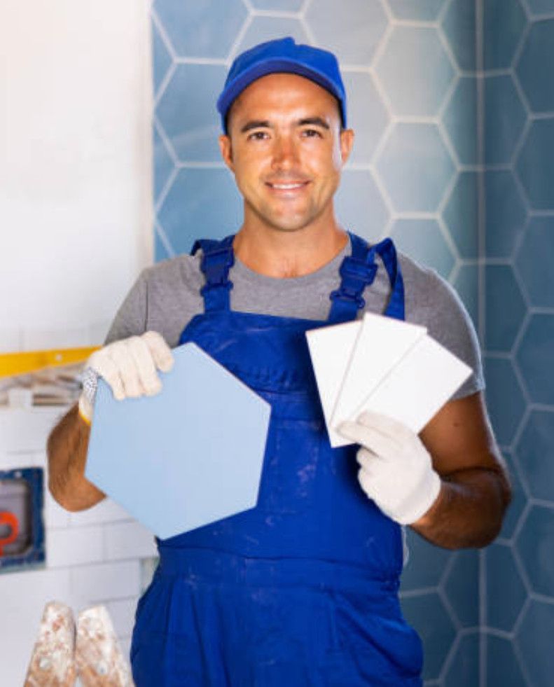 Friendly expert Swansea tiler offering support to a happy customer.